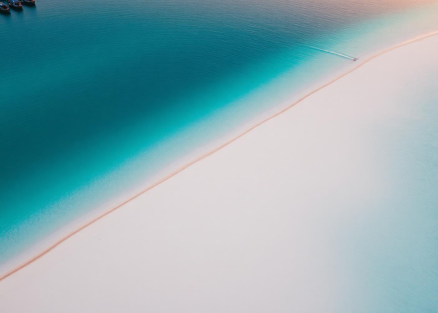 Turquoise lagoon meeting white sand